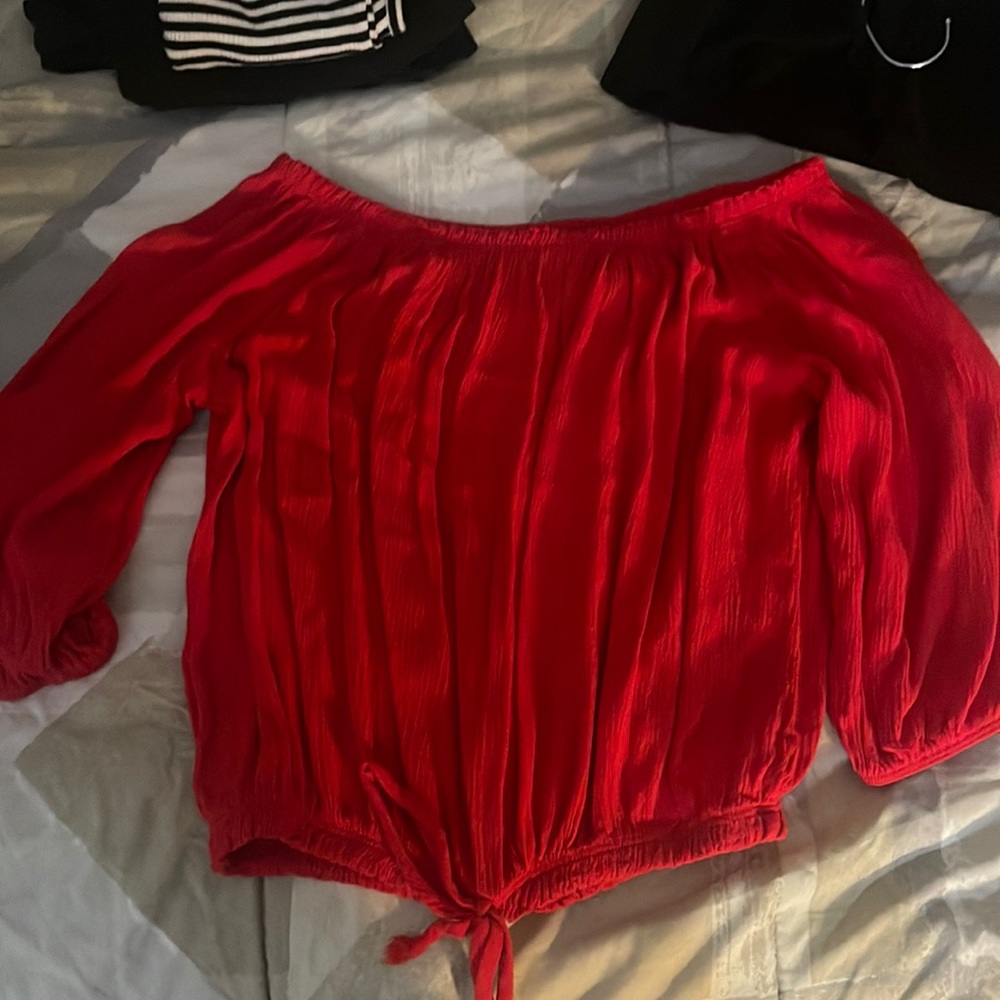 red silky flowy crop top with medium length sleeves and sinchable